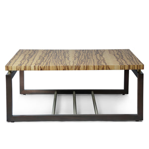 Black limba wood coffee table. The table has a walnut base and brass rod accents. The coffee table is finished in matte lacquer.