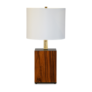 Rosewood lamp with white linen shade.